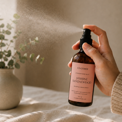 Hand spraying CocoBee Jasmine Sandalwood room and linen spray