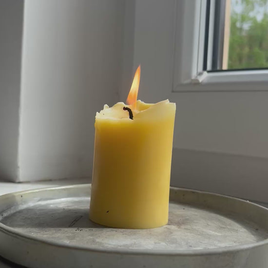 Classic clean molded candle burning